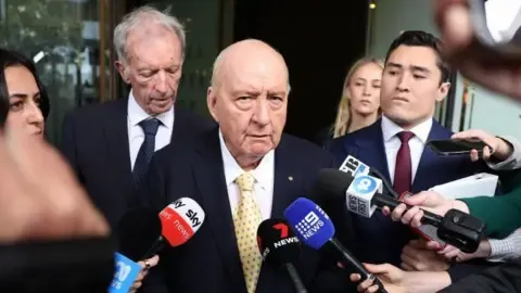 Indecent Assault Charges Involving Prominent Aussie Media Personality Downgraded